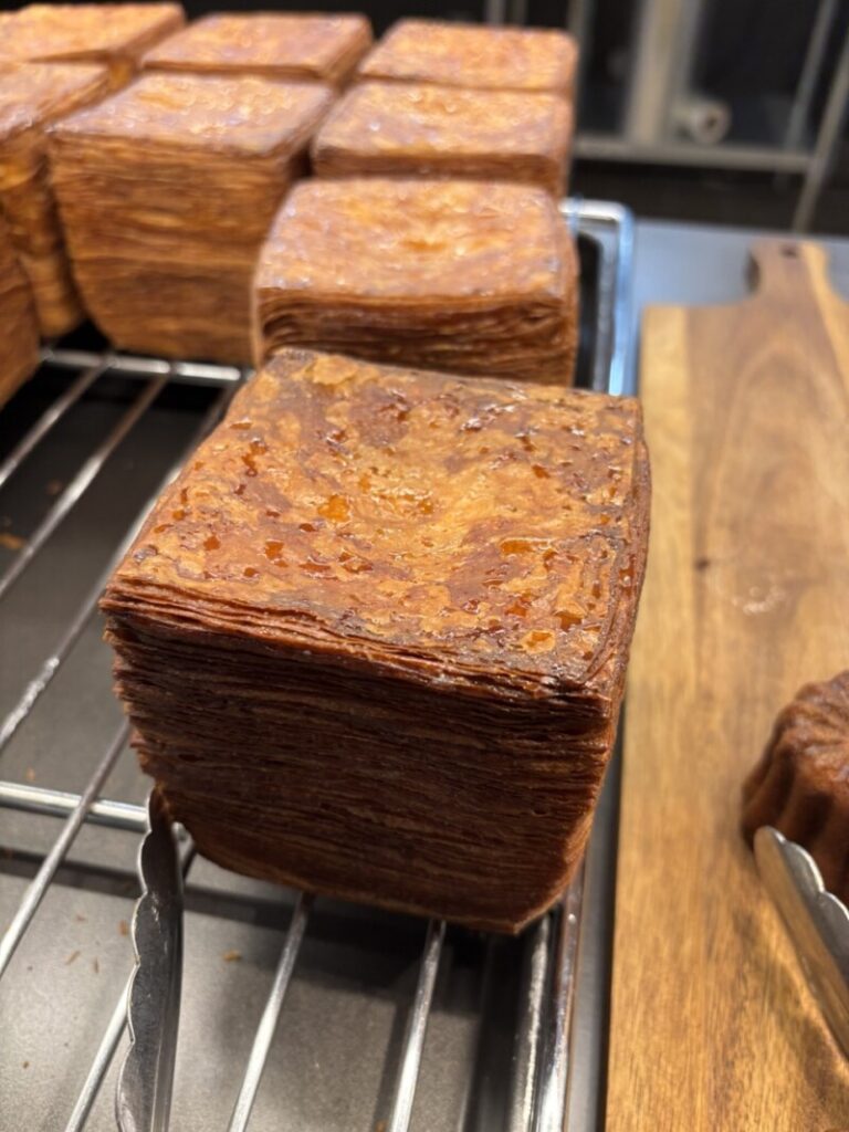 D'avant Bakery's signature 1000-layer pastry bread with a golden brown crust