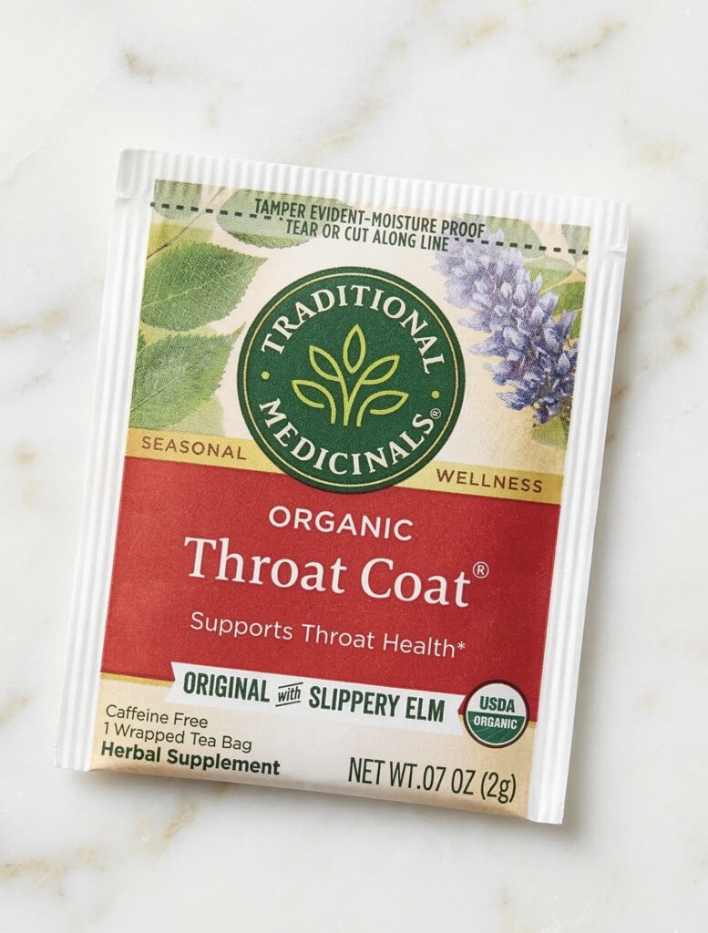 A cup of Organic Throat Coat Tea and a green healthy smoothie for morning wellness