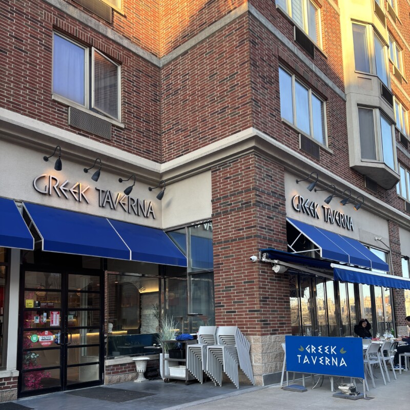 Greek Taverna Edgewater NJ outdoor dining table with authentic Mediterranean dishes